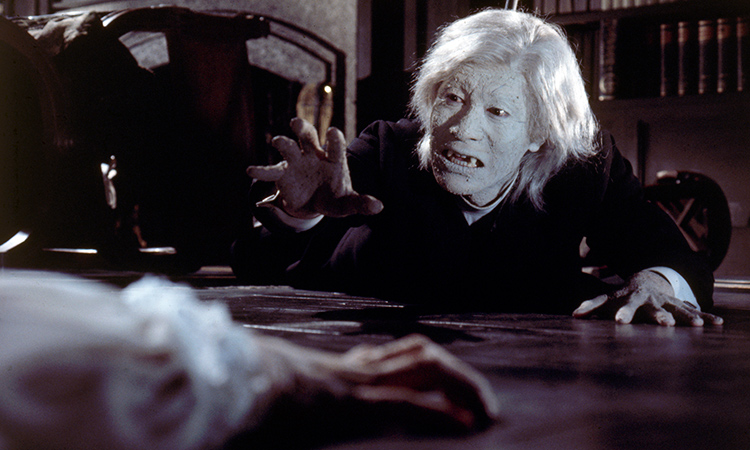 File:Evil of Dracula - the dying vampire reaches for the Madam.jpg