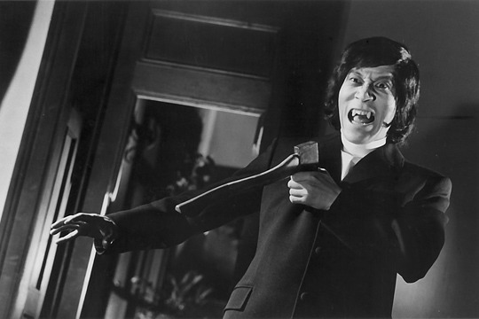File:Evil of Dracula - vampire with an axe in his chest.jpg