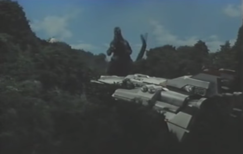 File:Godzilla and a downed Earth.png