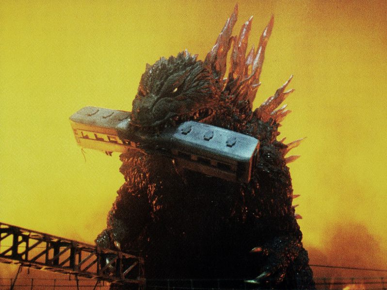 File:GXM - Godzilla Bites On a Train.jpg