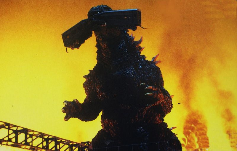 File:GXM - Godzilla Chomps On Train.jpg