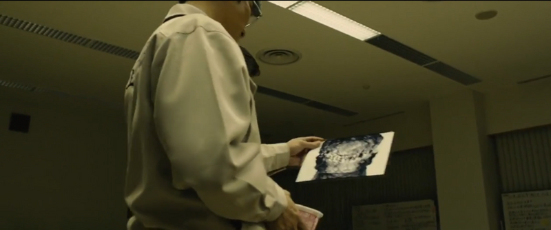 File:Someone holding a photo of Shin Godzilla.png