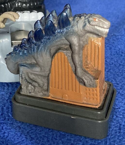 File:KFC Godzilla stamper .jpeg