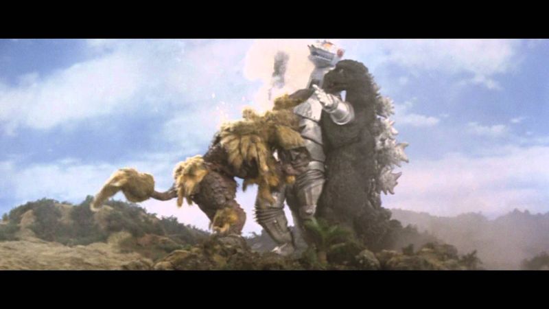 File:Two Monsters battling MechaGodzilla.jpg