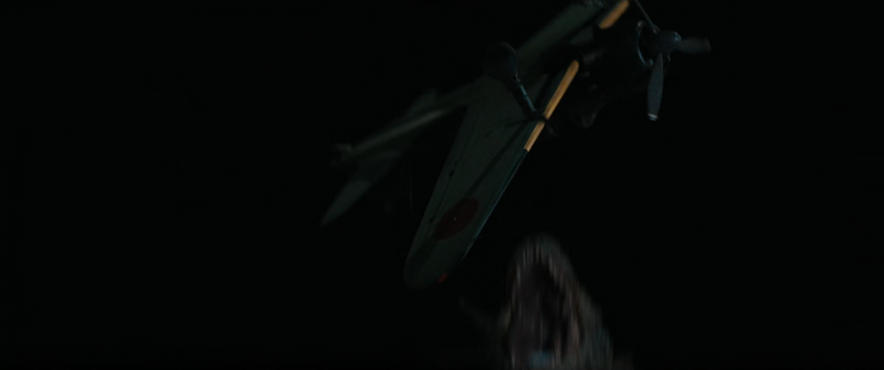 File:Godzilla Minus One - Godzilla throws Shikishima's Zero into the air.png