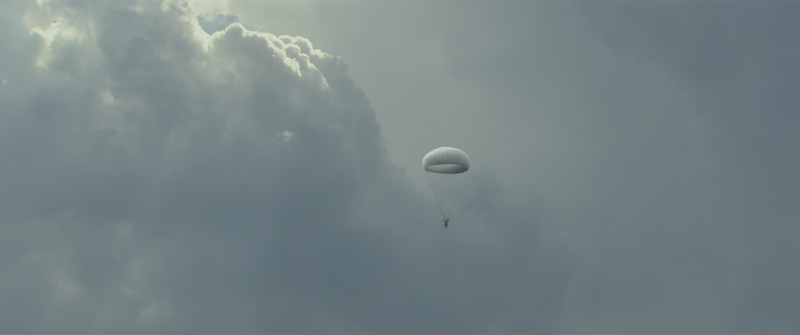 File:Godzilla Minus One - Shikishima parachuting to safety after ejecting.png