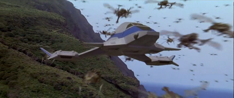 File:Godzilla vs. Megaguirus - Hundreds of Meganulas fly past the Griffon.png