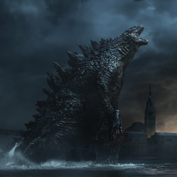File:G14 - Godzilla with M.U.T.O.'s head in his hands.png