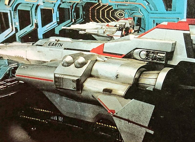 File:MPOG - Earth in hangar side.jpg
